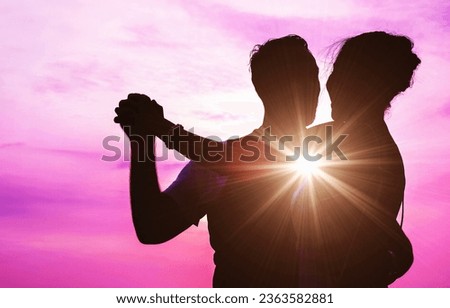Silhouette Soulmate lover freedom dancing celebration event over romance sunset sky, meeting true love manifestation, twin flames, spiritual couple with Miracle bokeh light.
