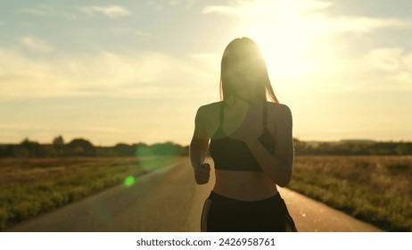 silhouette sports girl running along road sunset, summer thailand, healthy lifestyle, cardio wellness, athletics fitness, athlete exercise sunrise, woman running treadmill. healthy woman running