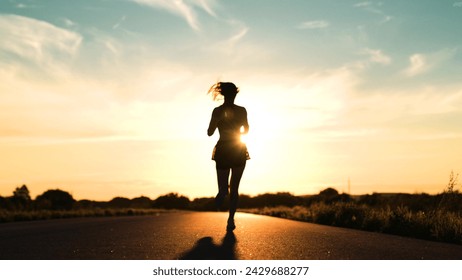 silhouette sports girl running legs along road sunset, after runner competition, mountain trail running, woman runs, warming up before training, fit athletic girl runs dawn, american woman running - Powered by Shutterstock