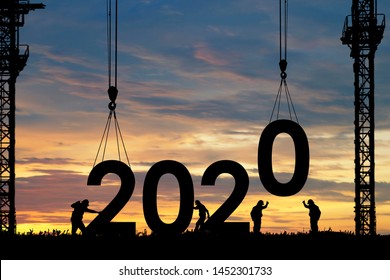 Silhouette staff works as a team to prepare to welcome the new year 2020 - Shutterstock ID 1452301733