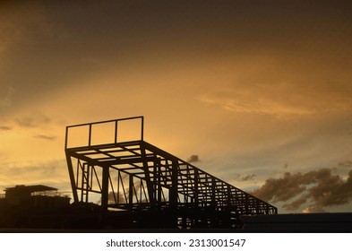 silhouette of the structure at sunset