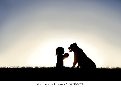 A Silhouette Of A Sweet Little Girl Child Sitting Outside With Her Friendly Family Pet Dog.