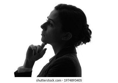 Silhouette Of Thinking Caucasian Woman.