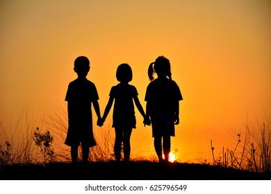 Silhouette Three Children Friendship Sunsetpeople Friendship Stock ...