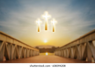 Silhouette three christian cross on colorful sky withe blurred image of wooden bridge with lighting,religion concept. - Shutterstock ID 638394208