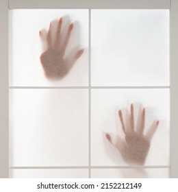 Silhouette Of Trapped Persons Hands Behind Translucent Screen