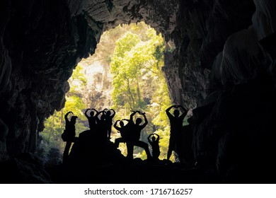 Silhouette of traveler in Nang Aen Cave at Lam Khlong Ngu National Park, Kanchanaburi Unseen in Thailand. 