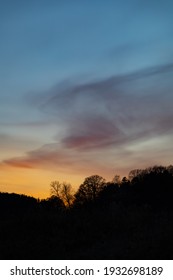 Silhouette Of Treeline And Sunset. Shot At Dusk In Early Spring In Sweden, Scandinavia.