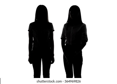 Silhouette Of Two Young Women On White Background