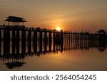 Silhouette of U bein bridge at sunset, Amarapura, Mandalay, Myanmar (Burma).