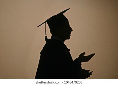 Silhouette Of A University Professor During The Opening Ceremony Of The Academic Year