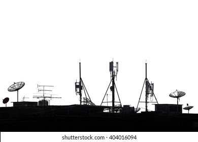 Silhouette Various Communication Devices On Rooftop; Cell Site, Satellite Receiver, TV Antenna