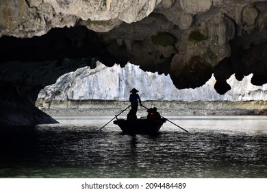 Silhouette Of Vietnamese Rower In Non La Conical Hat