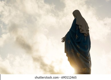 Silhouette of virgin Mary statue