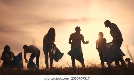 silhouette volunteers collect plastic. group team people collect plastic bottles together. environmental protection business concept. volunteers family lifestyle collect plastic clean nature - Powered by Shutterstock