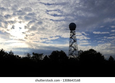 Silhouette Of A Weather Radar Tower