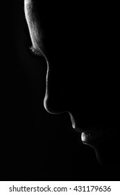 Silhouette Of A Woman Face In Black And White With Rim Lighting