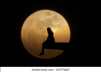 silhouette of woman with full moon, selective focus,