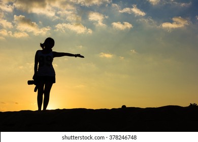 silhouette woman hand up sunset background   - Shutterstock ID 378246748