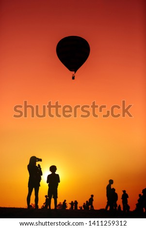 Similar – Two people watching the sunset