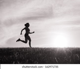 Silhouette Of Woman Running