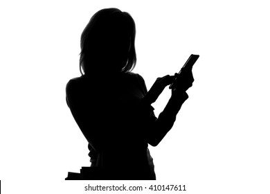 Silhouette Of A Woman With Shopping Bags And A Smartphone