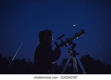 Silhouette Of A Woman, Telescope, Stars, Planets And Shooting Star Under The Night Sky.