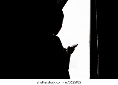 スマホ 女性 シルエット の写真素材 画像 写真 Shutterstock