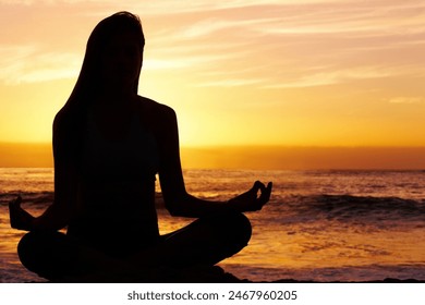 Silhouette, yoga and person at beach for meditation, wellness and mindfulness in outdoor nature. Sunset, zen peace or calm yogi on sand at sea or ocean for awareness, balance or spiritual lotus pose - Powered by Shutterstock