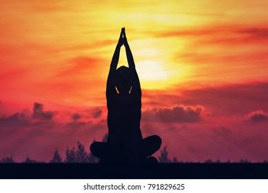 Silhouette Yoga Woman With Sun Rise.