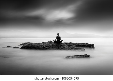 Silhouette of a Yogi in Lotus Pose - Powered by Shutterstock