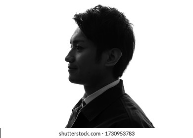 Silhouette of young asian businessman.