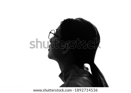 Silhouette of young asian businesswoman.