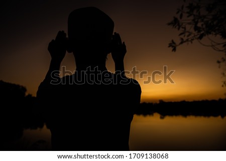 Similar – A girl from the 2019 Queensland National Team watches the sunset in Adelaide.