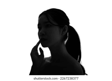 Silhouette of young Asian woman profile. - Powered by Shutterstock