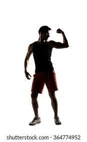 Silhouette Of Young Male Athlete, Full Length Portrait Isolated