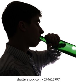 Silhouette of Young Man drinks a Beer on the White Background