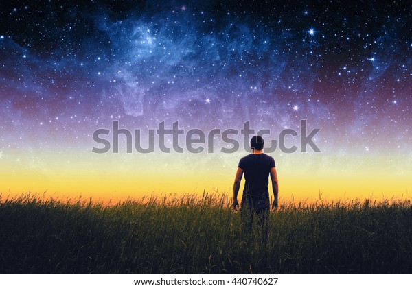 Silhouette Young Man On Stars Sky Stock Photo Edit Now 440740627