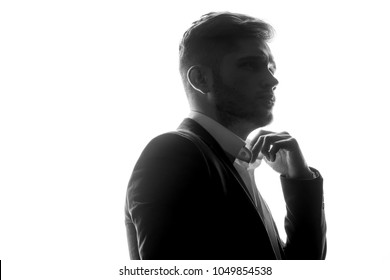 Silhouette Of Young Man Portrait With Hand On Studio Isolated White Background. Close Up.