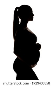 silhouette of a young pregnant woman on a white background