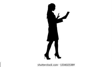 Silhouette Young Woman Doctor Holding Tablet In Her Hands And Making Video Call.