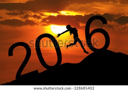 Silhouette young woman jumping on the hill and forming numbers 2016 while celebrating new year