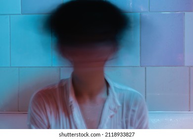 Silhouette of young woman in wet shirt out of focus, in moment of movement, indoors with tiles, magenta filter awesome, unstable mental health, mental disorder. imbalance, drug addiction, hallucinatio