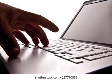 Silhouetted Image Someone Typing On Laptop Computer Symbol Shadow Economy Illegal Operations Cracking Computer Passwords Fraud Hacking Advertising Sales Illegal Non Payment Taxes Concealment Income