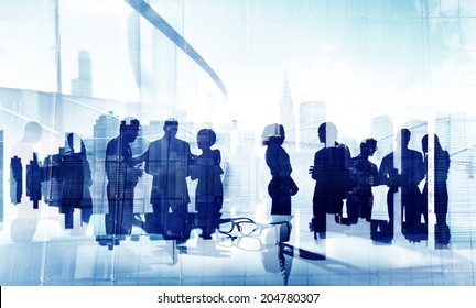 Silhouettes of Business People Brainstorming in Groups