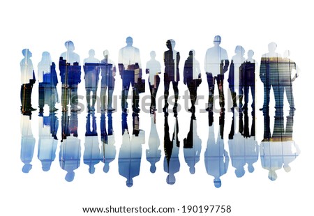 Silhouettes of Business People Overlayed with Cityscape