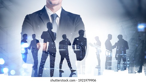Silhouettes of business people working at corporate office in downtown. Work hard and business development concept. Double exposure - Shutterstock ID 1921979906