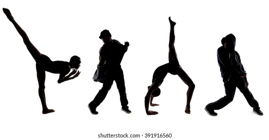 Silhouettes dancers posing and