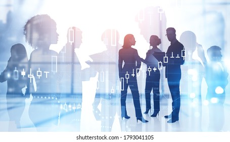 Silhouettes of diverse business people working in blurry office with double exposure of cityscape and digital graphs. Toned image - Shutterstock ID 1793041105