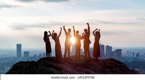 Silhouettes of happy businessperson. Success of business concept. - Powered by Shutterstock